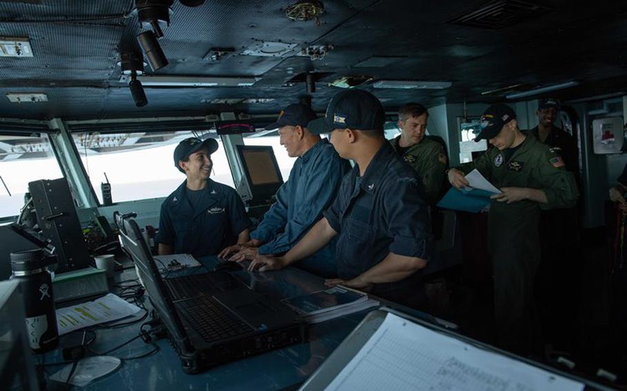 PACIFIC OCEAN (Aug. 11, 2018) Actor Woody Harrelson speaks with Sailors aboard the Nimitz-class aircraft carrier USS John C. Stennis (CVN 74). The Sailors here are showing Harrelson how they navigate the nearly 90,000-ton ship that supports the 4.5 acre floating flight deck and more than 70 advanced naval aircraft. (U.S. Navy photo by Mass Communication Specialist 3rd Class Joseph Miller/Released)