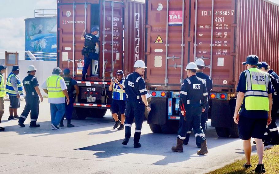 U.S. Coast Guard Forces Micronesia/Sector Guam personnel spearhead a comprehensive Multi-Agency Strike Force Operation (MASFO), meticulously inspecting 172 containers at the Port of Guam, on April 18, 2024. This operation is part of ongoing efforts to ensure the safety and security of containerized cargo, which is crucial for the island’s economy and environmental protection. The MASFO brought together various agencies, including the Guam Customs and Quarantine Agency, Port Authority Police, the U.S. Food and Drug Administration, and other law enforcement and regulatory bodies.