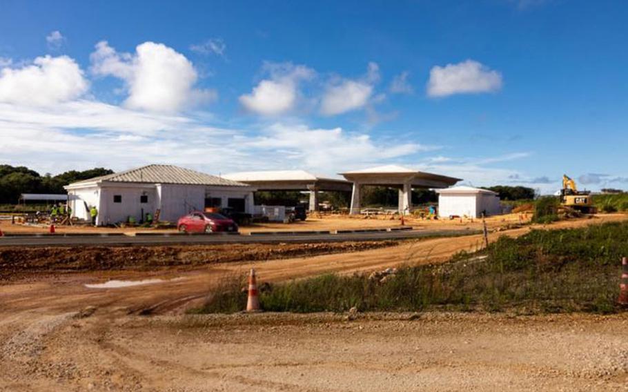 Construction workers build a vehicle search checkpoint on the main cantonment site of Marine Corps Base Camp Blaz, Guam, Jan. 16, 2023. MCB Camp Blaz is under construction to accommodate future incoming units. The military presence in Guam plays an essential part in the 38th Commandant of the Marine Corps’ 2030 Force Design goal of shifting the Marine Corps’ mission to the Indo-Pacific. (U.S. Marine Corps photo by Lance Cpl. Thomas Sheng)