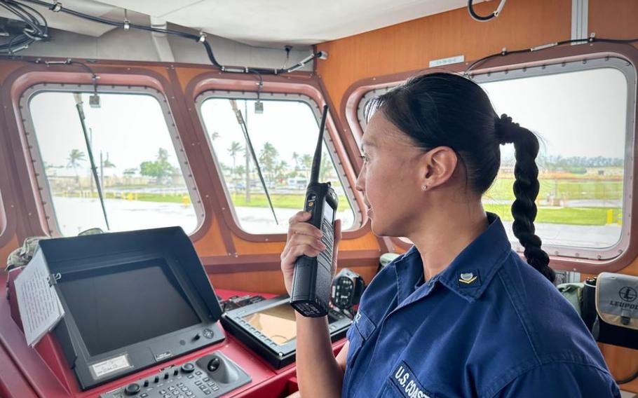 Petty Officer 3rd Class Trina Perez, an information systems technician, conducts a successful radio check over VHF-FM communications from the bridge of the USCGC Myrtle Hazard (WPC 1139) following an outage in Guam on Jan. 17, 2024. The U.S. Coast Guard Forces Micronesia/Sector Guam crews successfully resolved the Rescue 21 issue restoring VHF-FM radio communications in the Mariana Islands, the evening of Jan. 15. (U.S. Coast Guard photo by Chief Warrant Officer Sara Muir)