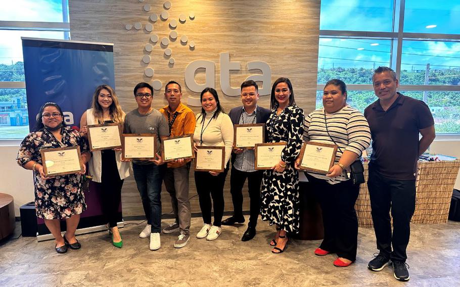 Photo from L-R- GinaRose Cruz, Judy Rosario, Don Martinez, Derek Quitugua (accepting award on behalf of Steve Jackson), Jisela Martinez, Kyle Duenas, Stacy Elarmo, Stefanie Ditchens, Roland Certeza (President and CEO) ***Not pictured: Sharon Davis, Nate Denight, Crena Byerly, Steve Jackson