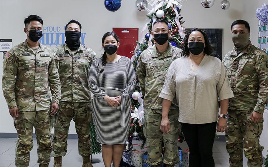 From left, Pvt. 1st Class Charles Manacmul, Spc. Javier Rodriguez, Ms. Janae Perez, Maj. Bumjin Park, Mrs. Vanessa Toves, and Spc. Roy Taimanglo of the Guam National Guard’s Directorate of Information Management team recently scored among the top four states and territories in the nation, during a periodic National Guard Command Cyber Readiness Inspection in December 2021.