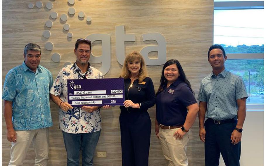 Photo by GTA: From Left to Right- Phillip Santos (USO Guam Council Immediate Past President, Matson Navigation), Andrew Gayle (GTA Chief Operating Officer, USO Guam Council Member), Leigh Leilani Graham (USO Guam Area Director), Jadine Lujan (USO Guam Area Operations Manager), and Joe Ayuyu, Jr. (USO Guam Council Executive Officer, McDonald's of Guam and Saipan).