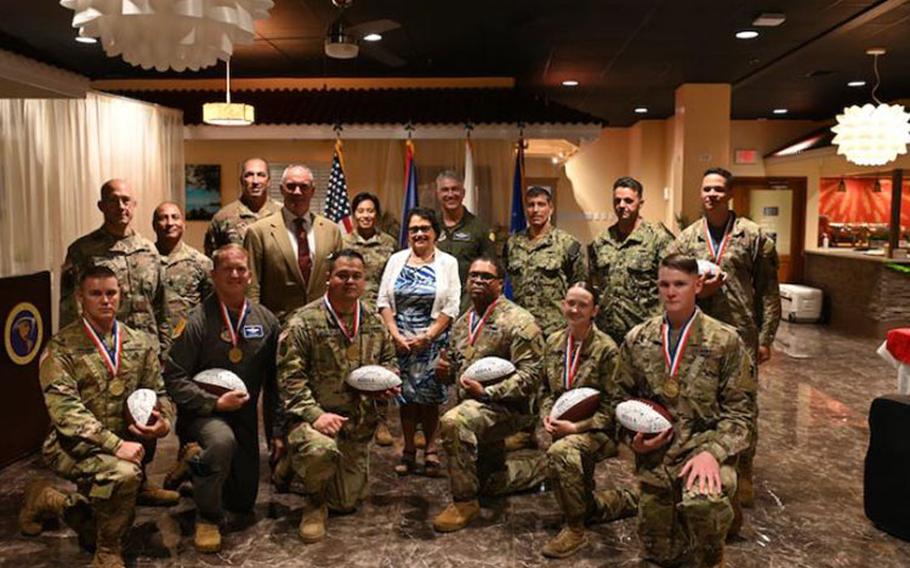 Gov. of Guam Lou Leon Guererro and Guam military leaders pose with the winners of the Guam Missile Defender of the Year Award at Andersen Air Force Base, Oct. 28, 2021. Missile Defense Advocacy Alliance's mission is to make the world safer by advocating for the deveolpment and deployment of missile defense systems to defend the United States, its armed forces, and its allies against missile threats. (U.S. Air Force photo by SSgt Nicholas Crisp)