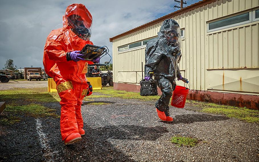 Survey Team members of the Guam National Guard’s 94th Civil Support Team approach a “contaminated building” during a training exercise at Fort Juan Muna, Jan. 17, 2024. The CST stands-by 24 hours a day, 365 days a year to respond to chemical, biological, radiological or nuclear (CBRN) incidents under the direction of the adjutant general and governor. (U.S. National Guard photos by Mark Scott)
