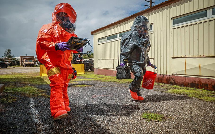 Survey Team members of the Guam National Guard’s 94th Civil Support Team approach a “contaminated building” during a training exercise at Fort Juan Muna, Jan. 17, 2024. The CST stands-by 24 hours a day, 365 days a year to respond to chemical, biological, radiological or nuclear (CBRN) incidents under the direction of the adjutant general and governor. (U.S. National Guard photos by Mark Scott)