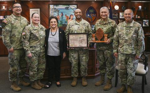 Photo Of Maj. Gen. Reginald Neal, center, deputy commanding general for the U.S. Army Pacific for Mobilization and Reserve Affairs, is presented with the Ancient Order of the Chamorri by Guam Governor Lou Leon Guerrero and Brig. Gen. Mike Cruz, adjutant general of the Guam National Guard, Hagåtña, March 28, 2024.