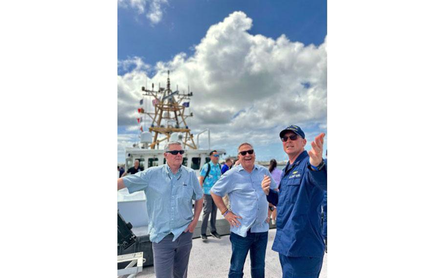 Capt. Nicholas Simmons, commander of U.S. Coast Guard Forces Micronesia/Sector Guam, discusses operations with Congressman Sam Graves, Chairman of the House Committee on Transportation and Infrastructure, and Congressman Mike Bost, Chairman of the House Committee on Veterans Affairs, from the deck of the USCGC Oliver Henry (WPC 1140) in Guam on April 26, 2024. The delegation, which included Congressmen David Rouzer, Troy Nehls, and Mark DeSaulnier, along with Guam Delegate James Moylan and key staff from both committees, spent the afternoon with crews, gaining firsthand insights into the critical operations of the Fast Response Cutters (FRCs) in the region. The delegation also toured essential infrastructure sites, including the damaged glass breakwater and the Port Authority of Guam, from the cutter and the cutter small boat. These sites are essential for military readiness, impact shipping routes, and influence the economic activity and cost of goods in the Marianas.