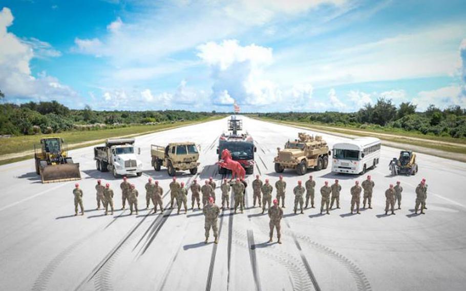 Airmen from the 554th RED HORSE Squadron, Silver Flag Flight, pose for a group photo at Northwest Field, Guam, Sept. 30, 2021. Silver Flag is a contingency training function dedicated to the continuing and evolving education of more than 13 different Air Force Specialty Codes from civil engineers, force support personnel and ground transportation specialists. (U.S. Air Force photo by Staff Sgt. Divine Cox)