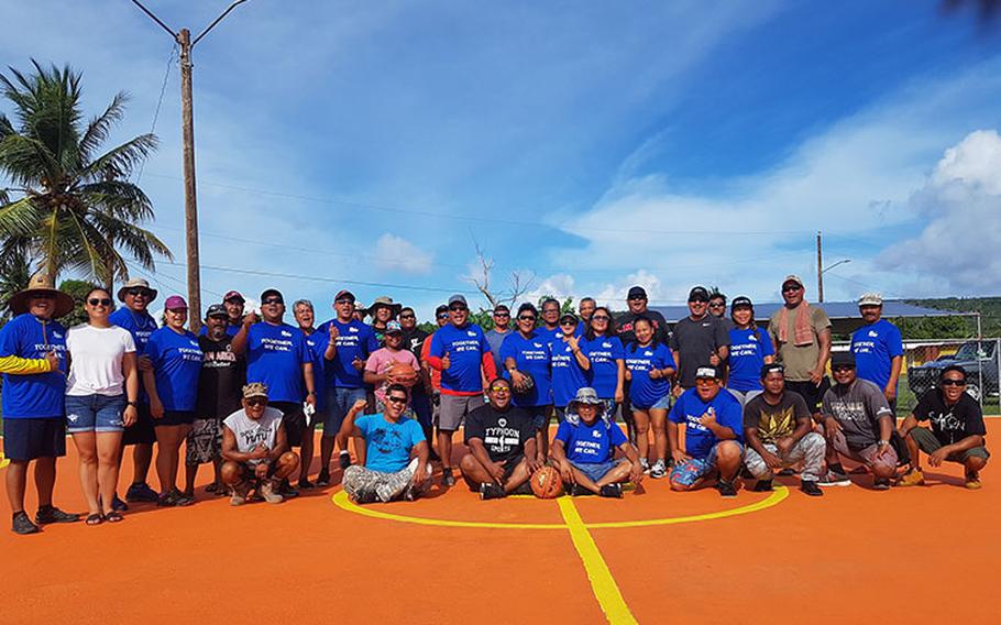 Supporters, partners, and volunteers from Tinian and Saipan pose for a group photo after completing the transformation project at the Broadway Estates Basketball Court on June 26. The site was adopted by the Tinian Mayor’s Office, Typhoon Sports Association, and FitBeat Anti-Tobacco Wellness as part of the Governor’s Council of Economic Advisers Public Private Partnership program.