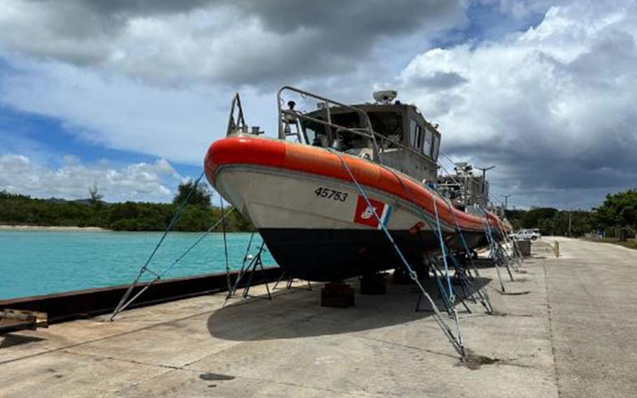 U.S. Coast Guard Station Apra Harbor 45-foot Response Boat Mediums are hauled out and attached to heavy weather tie-downs on May 21, 2023, in advance of Forces Micronesia Sector Guam crews ahead of the arrival of Typhoon Mawar. Tropical-storm-force winds are anticipated to hit Guam and May 23 and continue through early May 25, with heavy rainfall throughout the week. (U.S. Coast Guard photo by Chief Warrant Officer Sara Muir)