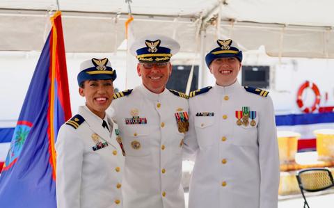 Photo Of Capt. Nicholas Simmons stands with Lt. Emma Saunders just after she’s taken command of USCGC Myrtle Hazard (WPC 1139) from Lt. Jalle Merritt in a change of command ceremony at Victor Pier in Apra Harbor, Guam, on April 19, 2024.