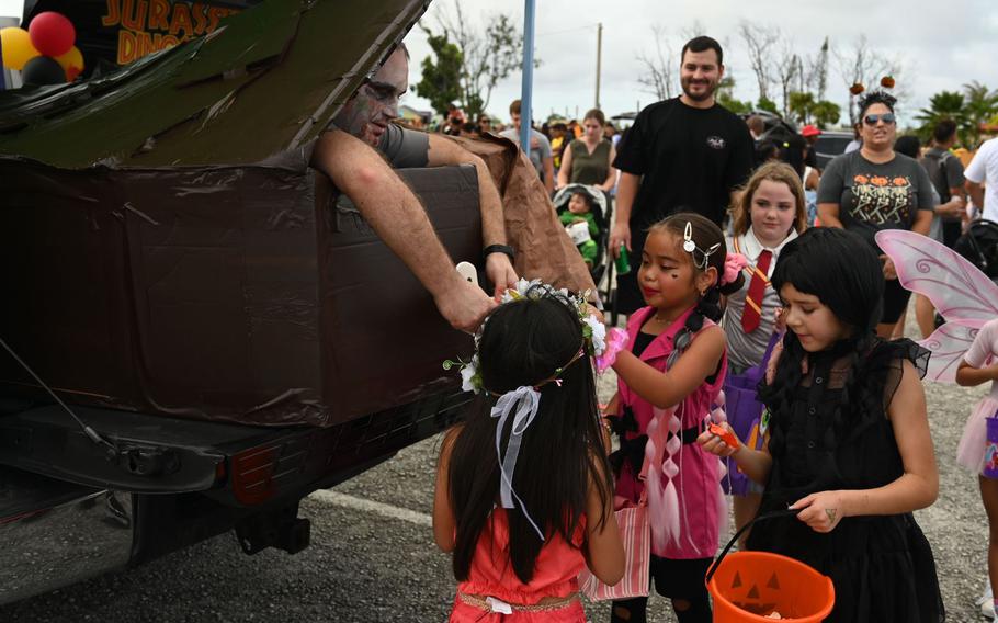 Children trick-or-treat at the Spooktacular Trunk-or-Treat event at the Sunrise Conference Center.