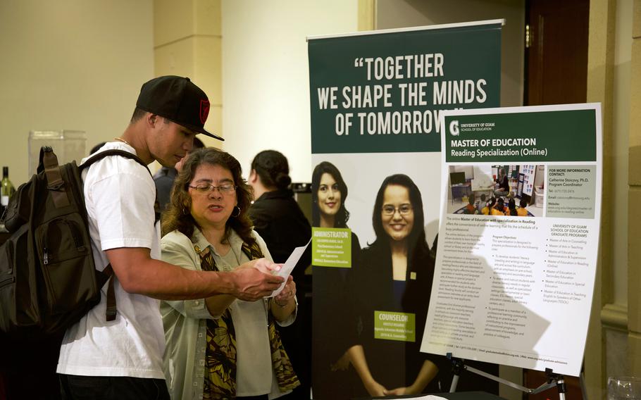 Joann C.E. Diego, a program coordinator for the University of Guam’s School of Education, provides information on the Master of Education in Reading program to a potential student at the UOG Graduate Program Recruitment Fair in 2018. The fair will take place online this semester on Thursday, April 14. Photo courtesy of the University of Guam