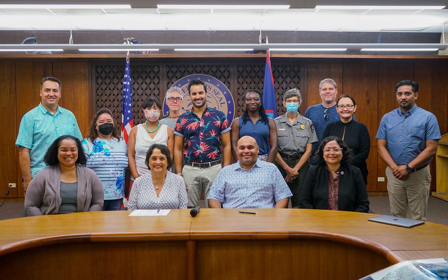 University of Miami Professor Ved Chirayath, standing center, with local scientists, natural resource managers, and government officials, including Gov. Lou Leon Guerrero, on June 20, 2022, at the Governor’s Complex following his technical presentation on a joint 3D coral reef mapping project with UOG.   Photo courtesy of the Office of the Governor