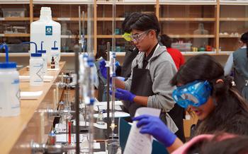 Teammates Segundo Garrido and Isaiah Moreno compete for Tiyan High School at the UOG Chemistry Titration Competition on March 7.