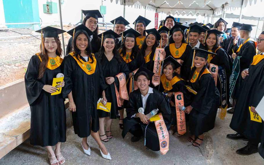 Nursing graduates gather for a photo before the University of Guam Fañomnåkan (Spring) 2025 Commencement Ceremony at the Calvo Field House on May 25.