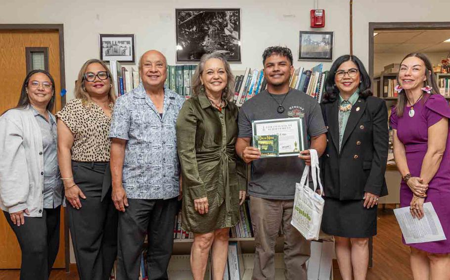 Caleb Cruz is awarded the Clotilde Gould and Johnny Sablan CHamoru Studies Award for his high academic standing and unwavering commitment to sustaining CHamoru language traditions.