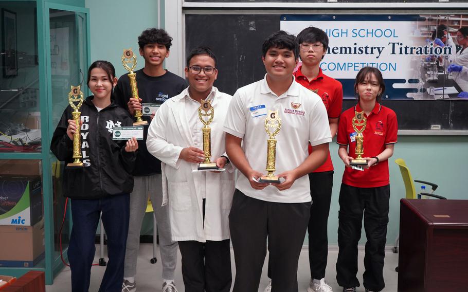 “Best Team” award winners of the 2024 Chemistry Titration Competition on March 7 at the University of Guam. (From left) Happi-Sleepi Perez and Timothy Gumataotao (Notre Dame High School), first place; Bernard Malicsi and Vincent Sablan (Father Dueñas Memorial School), second place; and Chanju Lee and Kaori Updegrove (St. John’s School), third place.