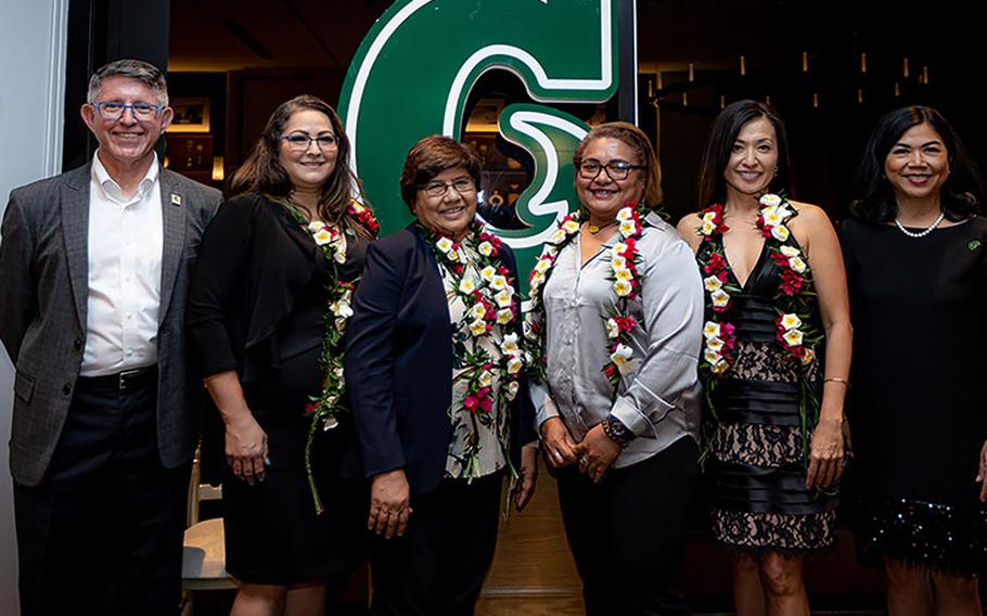 University of Guam President Thomas W. Krise, left, and Senior Vice President and Provost Anita Borja Enriquez, right, with the 2022 UOG Distinguished Alumni Award winners (from left) Carol Hinkle-Sanchez, Esq., College of Liberal Arts and Social Sciences; Jackie Quitugua, School of Education; Antonnette Merur, School of Health; and Mika Caldwell, School of Business and Public Administration. The awards ceremony was held Aug. 27 at the Hyatt Regency Guam. Photos courtesy of University of Guam