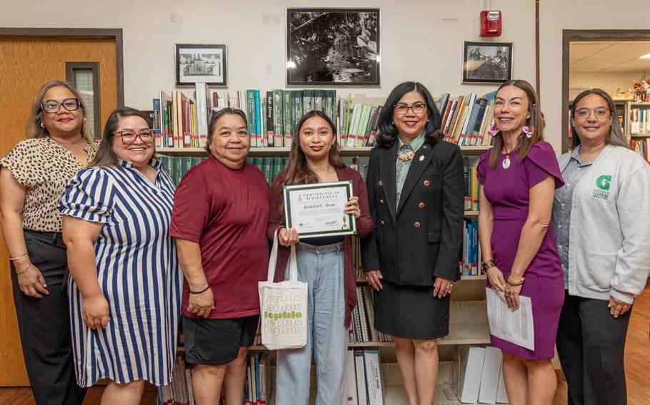 L-R: Senior Vice President and Provost Sharleen Santos-Bamba, CHamoru Author Chris Perez Howard’s niece Joleen Perez and cousin Joey San Agustin, Awardee Katielyn Aizon, UOG President Anita Borja Enriquez, UOG Press Director of Publishing Victoria-Lola Leon Guerrero, and University Libraries Dean Monique Storie