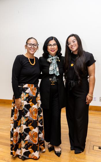 UOG President Anita Borja Enriquez stands with Drew Ann Laguaña (left) and Jerusa Laguaña (right) following the scholarship announcement ceremony.