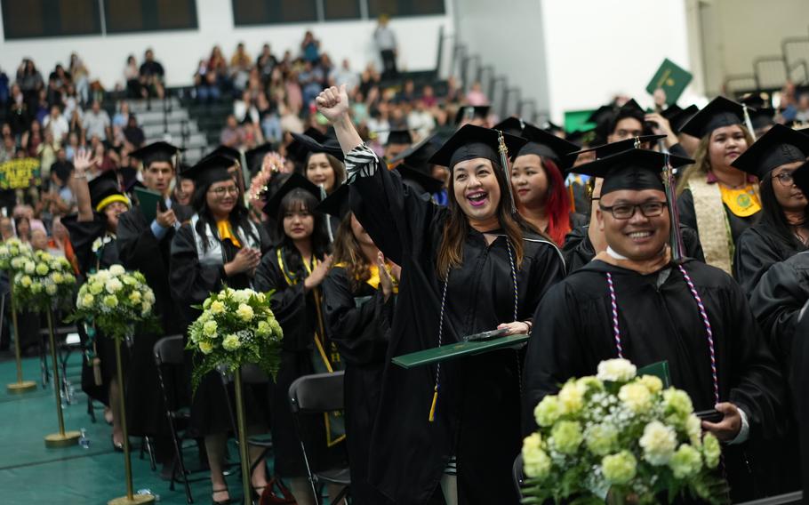 File photo: Members of the Class of Fanuchånan 2023 celebrate after turning their tassels at the University of Guam Commencement Ceremony on Sunday, December 17, at the UOG Calvo Field House.  