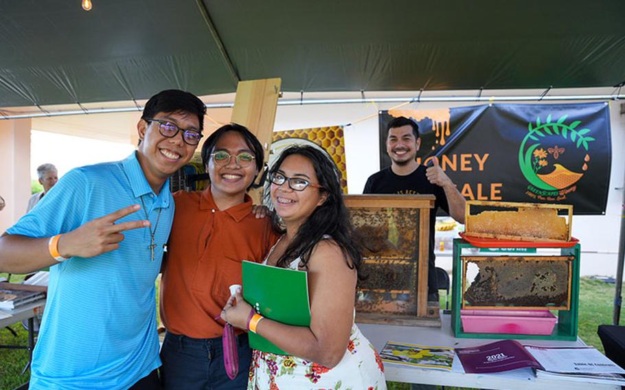 (From left) Ronald Fuellas, Joshua Martinez, and Kyra Perez learn about bee colonies and the benefits of backyard beekeeping at Green Night, a festival hosted by the College of Natural and Applied Sciences on April 20 in conjunction with the University of Guam’s Charter Day. On Oct. 26, the college will host Extoberfest, focusing on its extension mission of bringing practical education to consumers, families and youth, agricultural producers, and small businesses. Photos courtesy of University of Guam