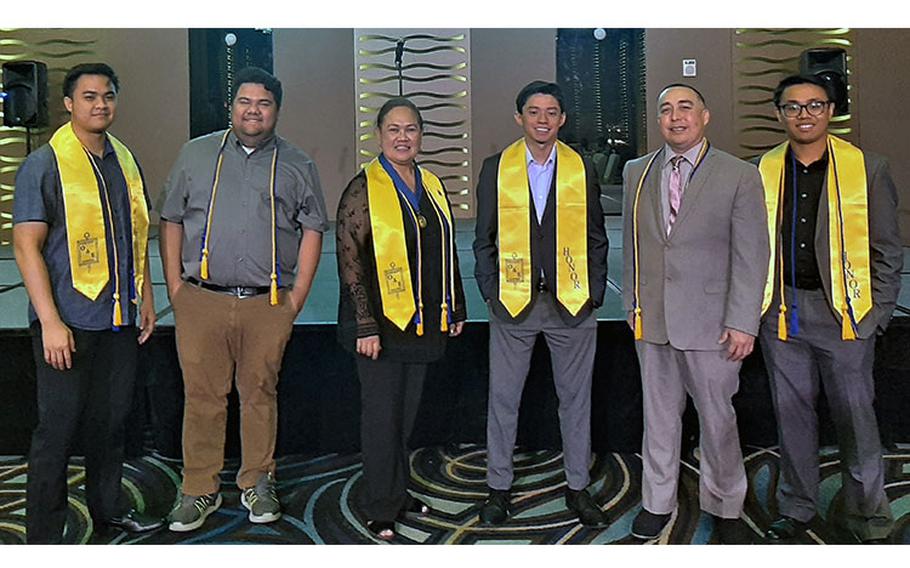 (From left) Austine Francisco, 2021 UOG alumnus in business administration; Joshua Hauge, business administration major with a focus on finance and economics; Professor of Economics Claret Ruane, chapter adviser; Angelo Paule, 2022 UOG alumnus in political science with a focus on economics; Dan Camacho, business administration major with a focus on economics; and Jomar Calumaya, 2022 UOG alumnus in business administration. Photos courtesy of University of Guam