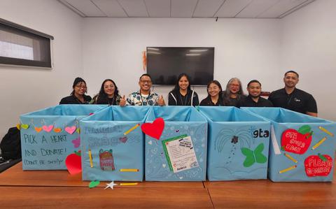 Photo Of GTA Volunteers Preparing and Decorating Boxes for the 2025 Back to School Supply Drive.