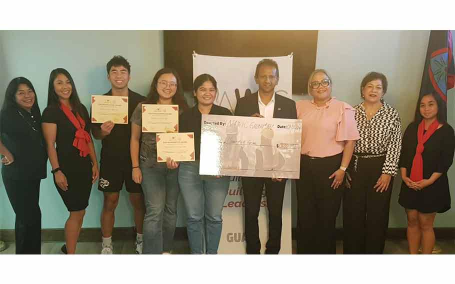 Three University of Guam engineering majors were each awarded a $1,000 scholarship from the Guam chapter of the National Association of Women in Construction (NAWIC). From left to right: Ann Marie Pelobello, NAWIC Guam chartering president-elect and scholarship chairwoman; Crystal Cruz, NAWIC Guam president; Andrew Shiroma, NAWIC Guam scholarship recipient; Merry Remetira, NAWIC Guam scholarship recipient; Anna Mallari, NAWIC Guam scholarship recipient; Dr. Hiroshan Hettiarachchi, Dean, UOG School of Engineering; Dr. Sharleen Santos-Bamba, Senior Vice President and Provost; Dr. Gena Rojas, Interim Dean, Enrollment Management and Student Success; and Drina Pelobello, NAWIC Guam vice president. 