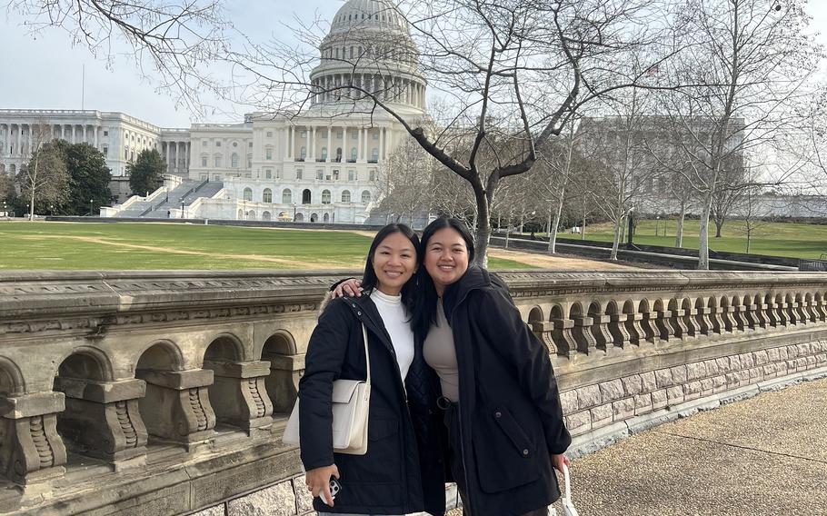 University of Guam agriculture majors Charlene Badajos, left, and Jamilee Cruz in February 2024 outside the USDA headquarters in Washington, D.C.