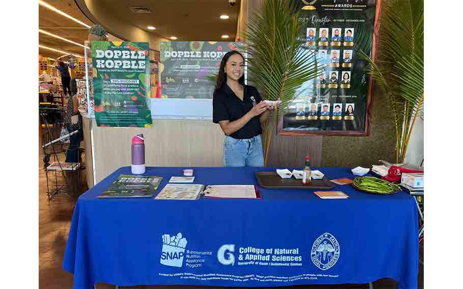 Sophie Santos, a Guam SNAP-Ed educator with University of Guam Cooperative Extension & Outreach, provides samples of a local dish made with sigidiyas (winged beans) during a cooking demonstration.