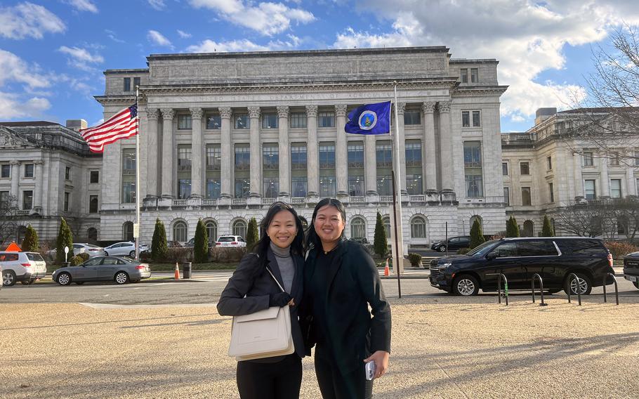 University of Guam agriculture majors Charlene Badajos, left, and Jamilee Cruz in February 2024 outside the USDA headquarters in Washington, D.C.