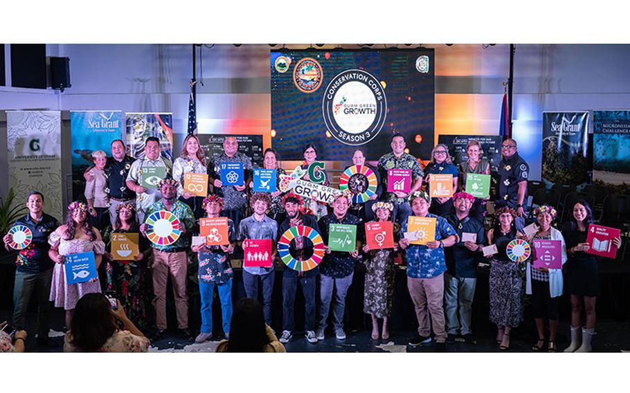 Members of the Guam Green Growth (G3) Conservation Corps pose with government and university leaders at the graduation ceremony on Friday, August 11, at the Sinajana Community Arts Hall.