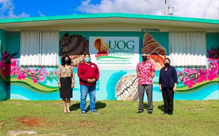 (From left) Anita Borja Enriquez, UOG senior vice president and provost; Mayor Allan Raymond Garcia Ungacta of Mangilao; Thomas W. Krise, UOG president; and Katrina Perez, executive director of the UOG Endowment Foundation at the unveiling of the foundation’s new building mural on Sept. 20. The building will be decked out in Halloween décor from 3 p.m. to 5 p.m. on Friday, Oct. 29, for a drive-through kickoff event for the foundation’s annual “G is for Giving” campaign. Photo courtesy of University of Guam