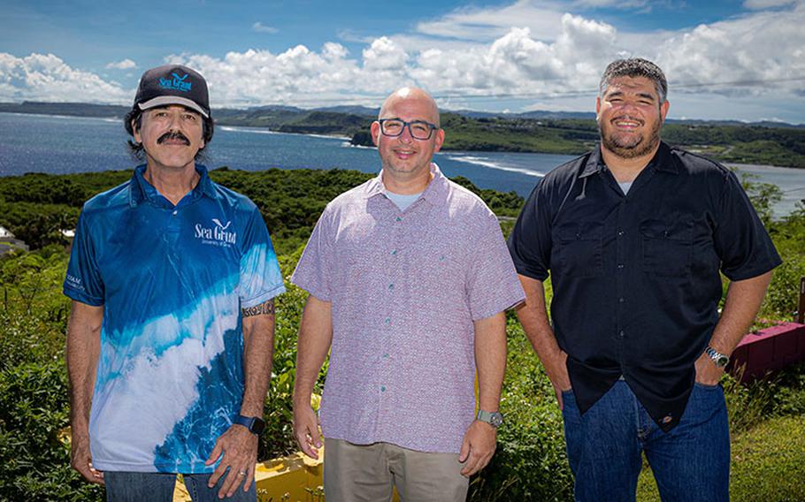 From left: David Patrick Crisostomo, aquaculture specialist at the University of Guam Sea Grant; Bastian Bentlage, associate professor of bioinformatics at the Marine Lab, UOG; and John Francis Limtiaco, assistant professor of chemistry at the College of Natural and Applied Sciences; are photographed on Jan. 12 on campus with Pago Bay in the background.  Photo courtesy University of Guam