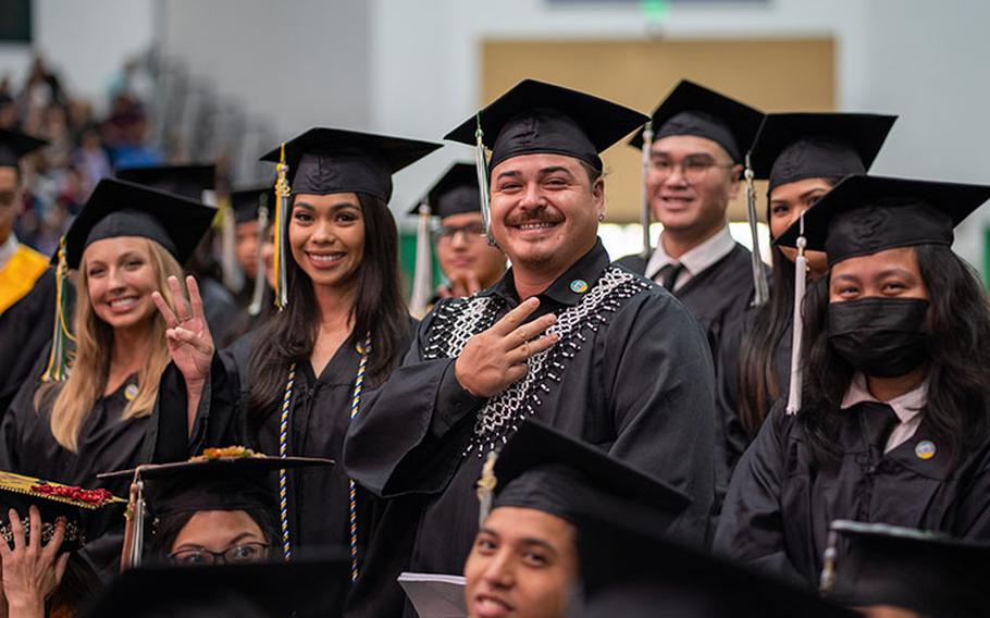 UOG graduates stand proudly during the University's Fanuchånan 2022 Commencement Ceremony on December 16, 2022. Photos courtesy of the University of Guam