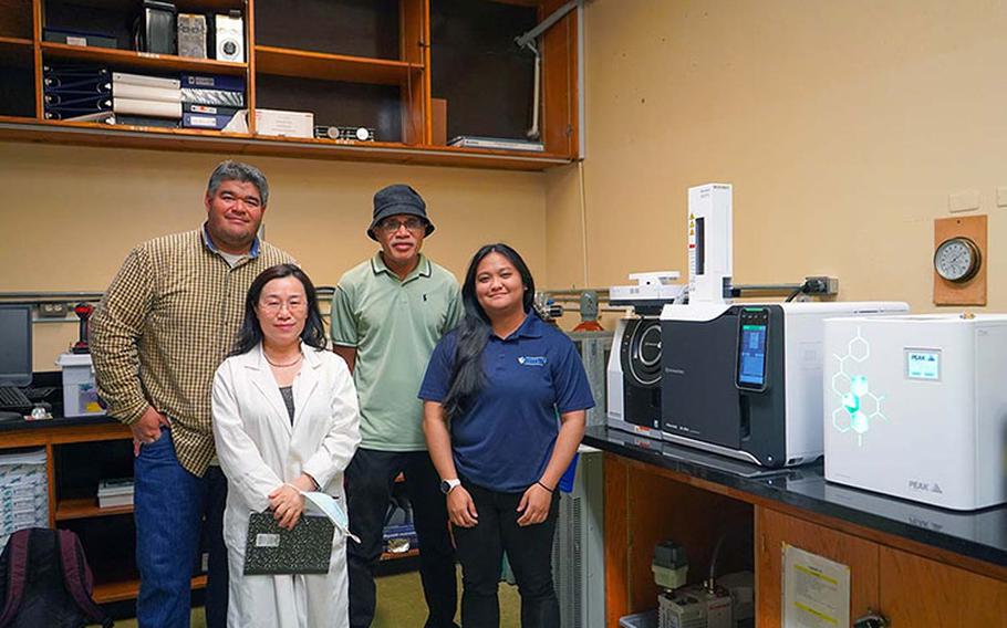 Associate Professor of Chemistry Dr. Bulan Wu inputs a substance into a gas chromatograph mass spectrometer for separation and identification of its chemical elements. The instrument is a new addition to UOG’s chemistry instrumentation lab. Photos courtesy of University of Guam