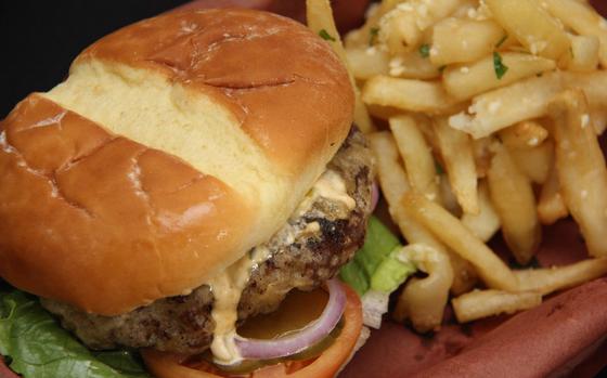 The Guam Brewery Tap House’s Tempura Tsunami Burger is infused with Guam Brewery beer, battered and flash fried to seal in the juices. This generously-sized and juicy burger is served with a side of fries, Caesar salad or the Tap House’s garlic fries, a customer favorite. Photo courtesy of The Guam Brewery Tap House.