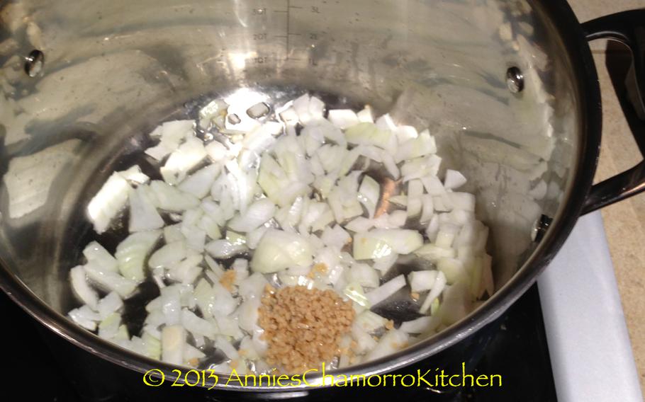 Place half of the diced onions in a large soup pot.