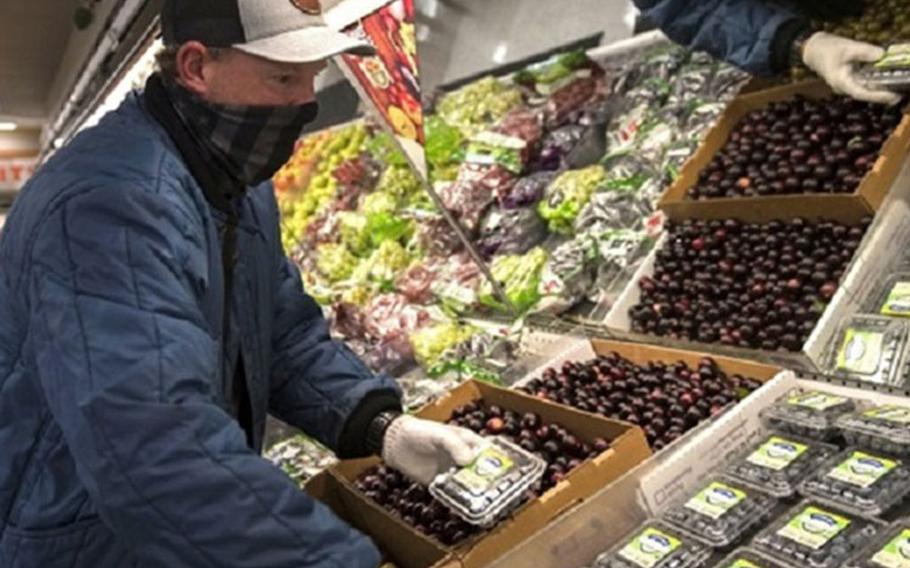 Greg Wagner, a store associate for the Hurlburt Field Commissary, restocks blueberries in the commissary on Hurlburt Field, Florida, Sept. 3, 2020. The commissary is one of the many facilities on the installation annually evaluated by the Health and Wellness Center for healthy food options to sustain combat-ready Air Commandos and their families (Air Force Airman 1st Class Robyn Hunsinger, 1st Special Operations Wing).