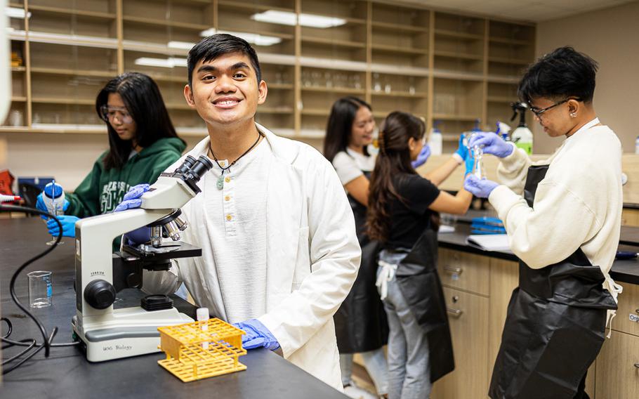 Students in a laboratory room.