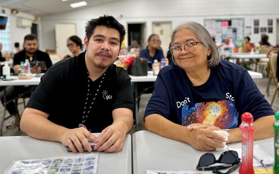 GTA staff member and participant pose for a photo.