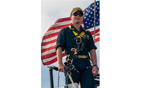 Photo Of Lt. Zachary Johnson stands on the conning tower of the Los Angeles-class fast-attack submarine USS Springfield (SSN 761) during a transit through Apra Harbor, Naval Base Guam, Dec. 18, 2024. Assigned to Commander, Submarine Squadron 15, Springfield is one of five fast-attack submarines forward-deployed in the Pacific. Renowned for their unparalleled speed, endurance, stealth, and mobility, Guam’s fast-attack submarines serve as the backbone of the Navy’s submarine force, ensuring readiness and agility in safeguarding maritime interests around the world.