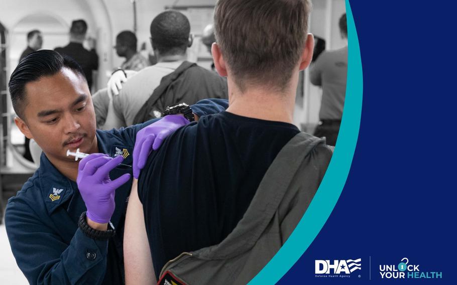 A man getting flu shot on his left arm.