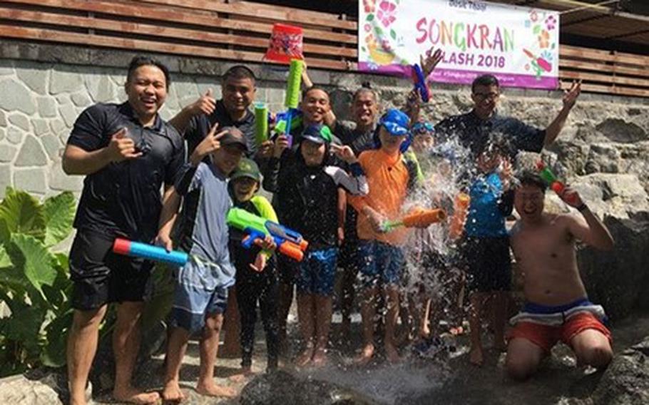 Hotel guests and staff engage in aquatic activities at the poolside during previous water festival in 2018. 