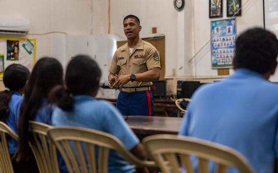 U.S. Marine Corps Staff Sgt. Jesse Benavente, station commander of Recruiting Sub-Station Guam, Recruiting Station San Diego, 12th Marine Corps District Headquarters and a native of Guam, speaks with Palau High School students during a Marine Corps recruitment presentation as part of exercise Koa Moana 24, at Palau High School, Koror, Palau, Aug. 22, 2024. This event is the first time Marine Corps recruiters have visited Palau in several years to discuss Marine Corps opportunities with the local community. During Koa Moana’s deployment throughout the Indo-Pacific region, U.S. Marines and Sailors from I Marine Expeditionary Force work to strengthen alliances and partnerships with development of interoperable capabilities, combined operations, theater security cooperation, and capacity-building efforts.