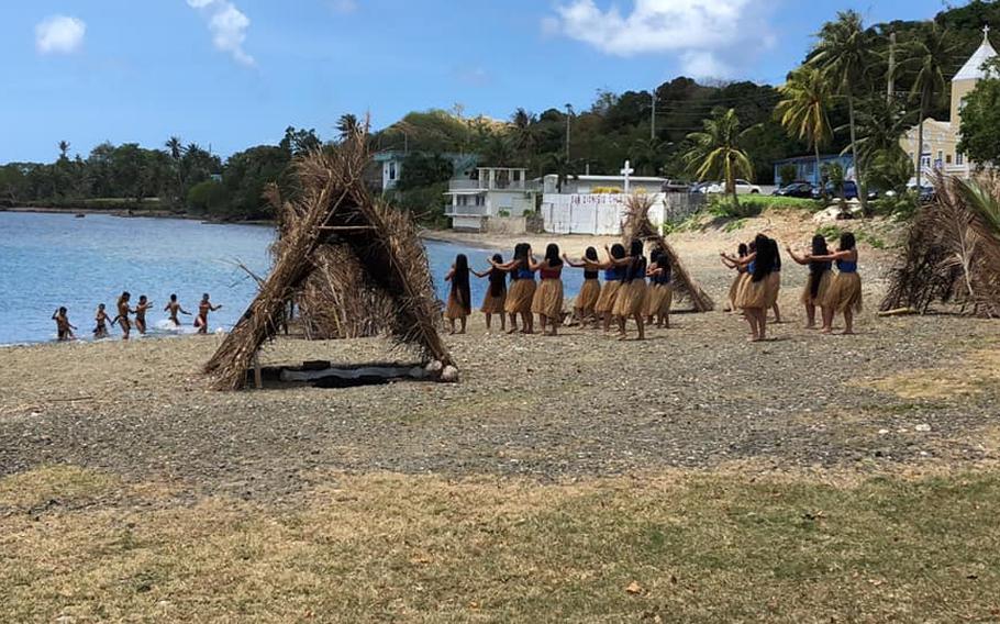som epeople are enjoying the beach. the others are dancing.
