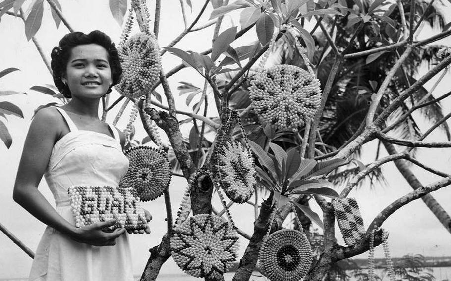 Akaleha’ Product Display on tree and also a woman is holding a product.